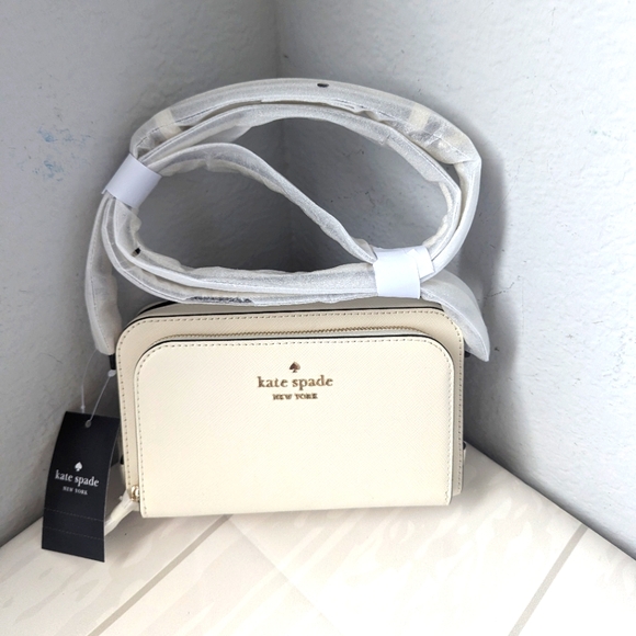 kate spade Handbags - NWT Kate Spade KG036 Staci Dual Zip Around Crossbody Meringue